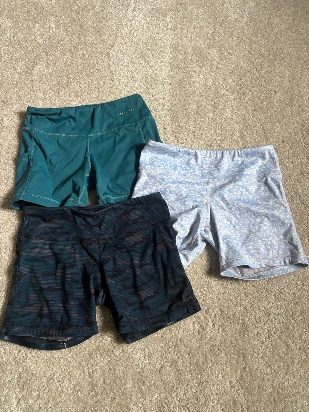 Women’s Athletic Shorts Trio — Teal, Light Blue Floral, and Black Camo